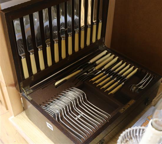 An oak cased canteen of plated cutlery